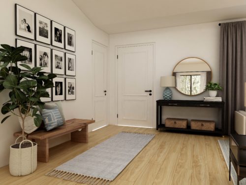 wood flooring and a rug by the front door